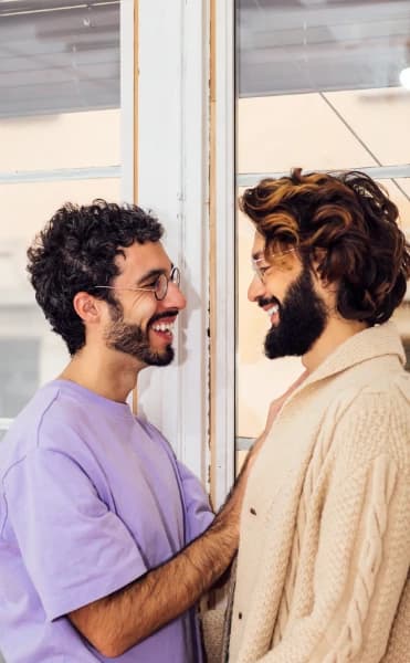 Happy gay couple dating online without apps