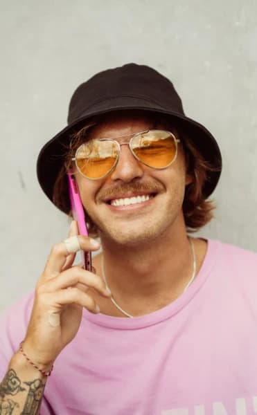 A gay man having a call in a gay chat room